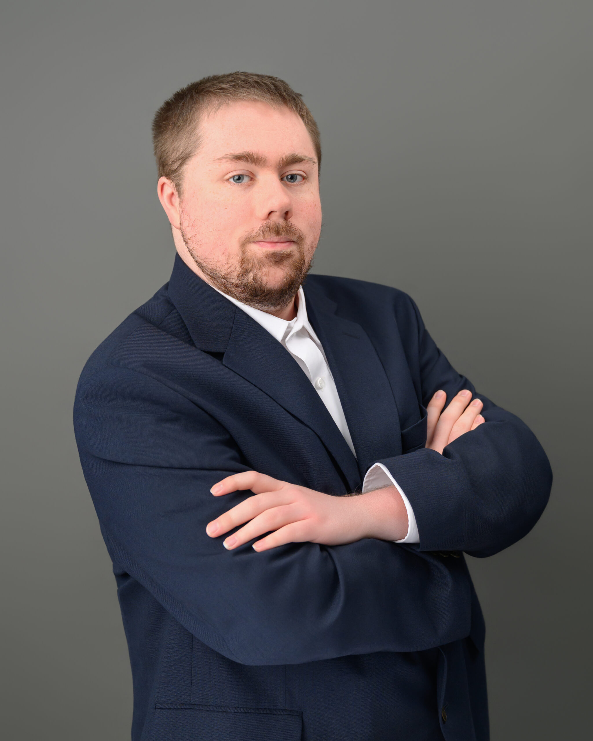 headshot photo of Ryan Maxwell